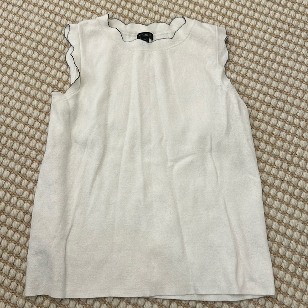 White sweater tank with black lining